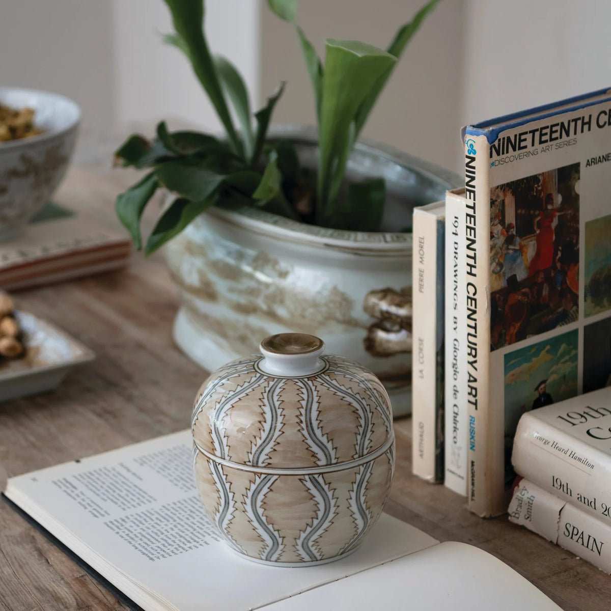 Decorative Hand-Painted Stoneware Jar with Design